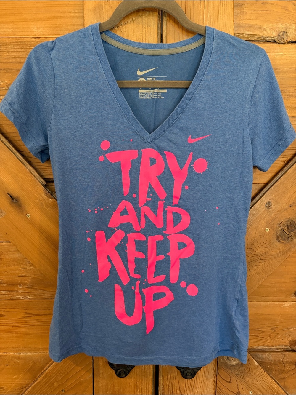Nike Blue V-Neck Tee with Pink 'TRY AND KEEP UP' Graphic